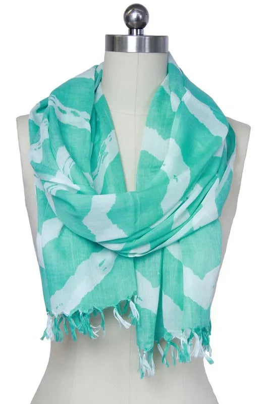Lightweight chevron print scarf for women made from 100 percent rayon, offering a soft and comfortable feel. This long scarf is a versatile all-season fashion accessory that adds a stylish touch to any outfit. Perfect for casual or formal wear, it can be easily draped, wrapped, or tied for various looks. Designed for comfort and elegance, this scarf is an essential addition to any wardrobe, blending classic patterns with modern style.