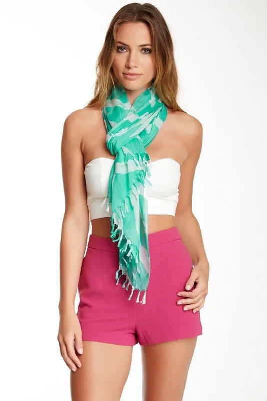 Lightweight chevron print scarf for women made from 100 percent rayon, offering a soft and comfortable feel. This long scarf is a versatile all-season fashion accessory that adds a stylish touch to any outfit. Perfect for casual or formal wear, it can be easily draped, wrapped, or tied for various looks. Designed for comfort and elegance, this scarf is an essential addition to any wardrobe, blending classic patterns with modern style.
