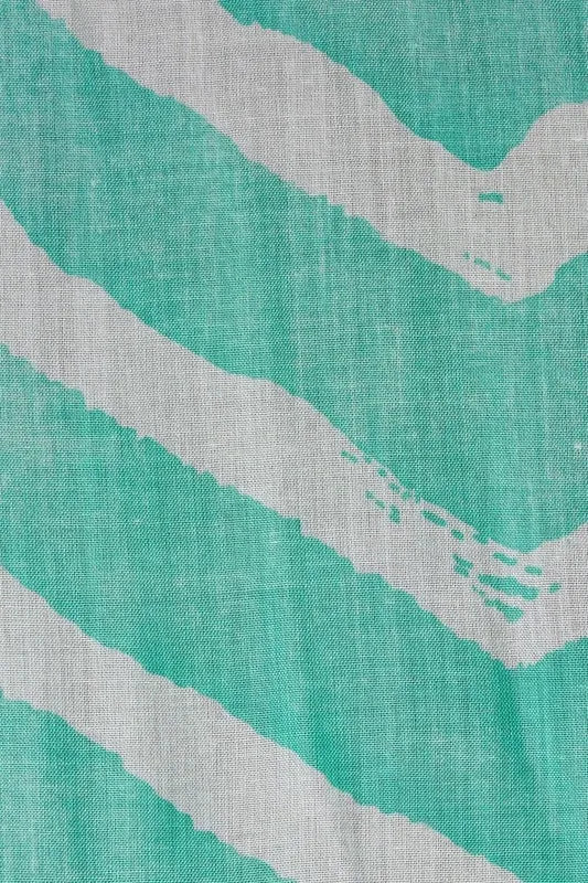 Lightweight chevron print scarf for women made from 100 percent rayon, offering a soft and comfortable feel. This long scarf is a versatile all-season fashion accessory that adds a stylish touch to any outfit. Perfect for casual or formal wear, it can be easily draped, wrapped, or tied for various looks. Designed for comfort and elegance, this scarf is an essential addition to any wardrobe, blending classic patterns with modern style.