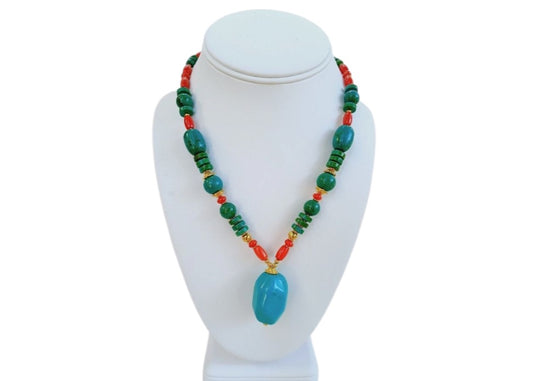 Handmade chunky Southwest style necklace featuring vibrant magnesite, turquoise, coral, and azurite stones. This bold statement jewelry piece combines natural gemstones with boho flair, perfect for women who love eye-catching accessories. Ideal as a unique gift for her, the necklace highlights colorful, handcrafted craftsmanship that complements casual and festive outfits with a striking, earthy vibe.