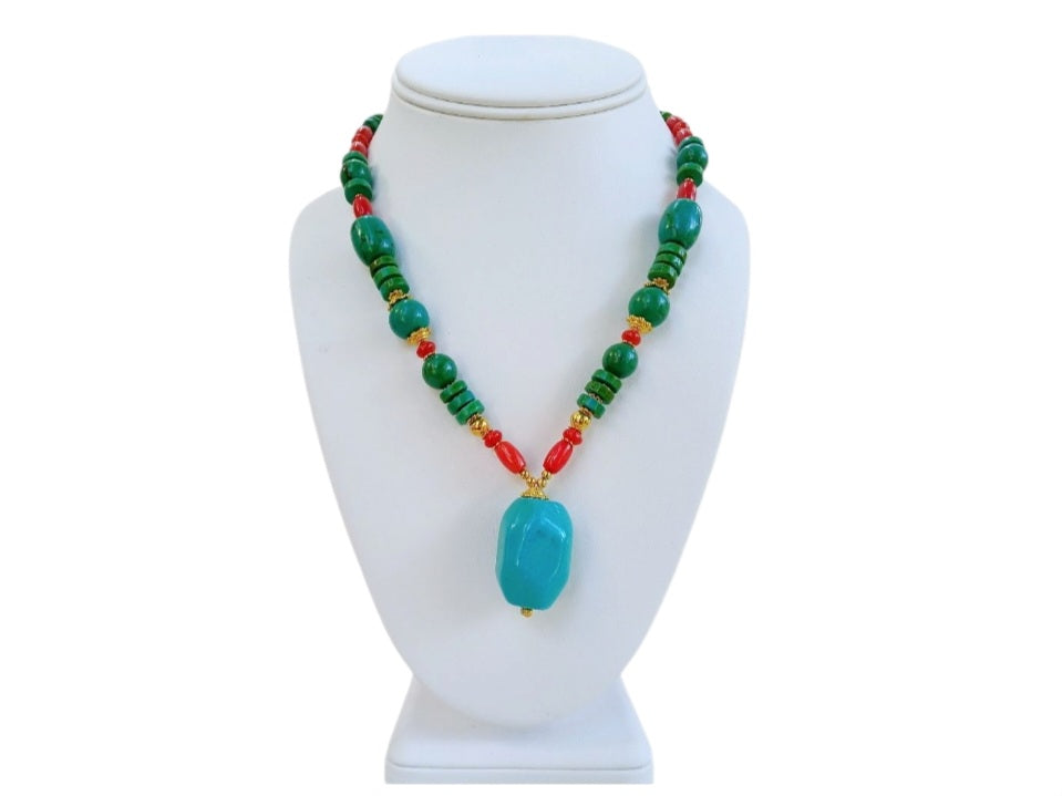 Handmade chunky Southwest style necklace featuring vibrant magnesite, turquoise, coral, and azurite stones. This bold statement jewelry piece combines natural gemstones with boho flair, perfect for women who love eye-catching accessories. Ideal as a unique gift for her, the necklace highlights colorful, handcrafted craftsmanship that complements casual and festive outfits with a striking, earthy vibe.