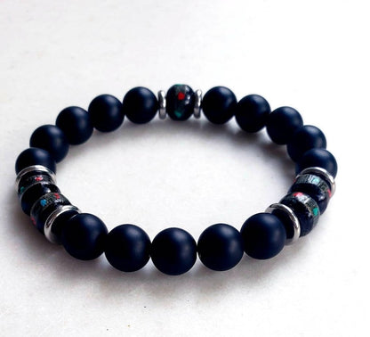 Handcrafted Onyx Bracelet for Men featuring yak bone, natural stone, and black lava beads. This minimalist Tibetan protection bracelet offers spiritual grounding and energy balance. Stylish yet meaningful, the black charm jewelry makes a unique handmade gift for men. Ideal for daily wear or special occasions, it combines tradition and modern design. Perfect men’s accessory for wellness, mindfulness, and style.
