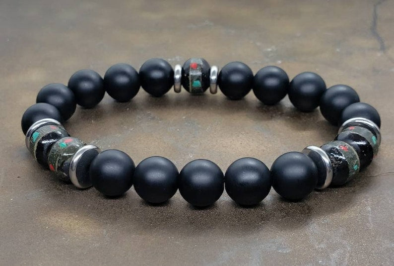 Handcrafted Onyx Bracelet for Men featuring yak bone, natural stone, and black lava beads. This minimalist Tibetan protection bracelet offers spiritual grounding and energy balance. Stylish yet meaningful, the black charm jewelry makes a unique handmade gift for men. Ideal for daily wear or special occasions, it combines tradition and modern design. Perfect men’s accessory for wellness, mindfulness, and style.