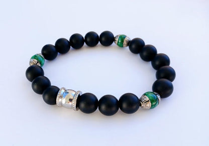 Natural Jade and Black Onyx Bracelet handcrafted as a men’s lucky charm and protection armband. This healing jewelry piece combines smooth jade and powerful black onyx stones, designed for strength, balance, and spiritual protection. Perfect handmade gift for him, ideal for birthdays, anniversaries, or wellness gifts. Stylish and meaningful, this men’s stretch bracelet blends natural energy with everyday wearable craftsmanship.