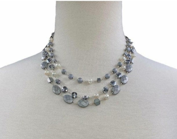 Natural Hematite and Pearl Beaded Necklace featuring a sparkly silver-tone design handcrafted for women who love elegant, unique jewelry. This eye-catching necklace combines the reflective shimmer of hematite with the soft luster of pearls, creating a sophisticated accessory perfect for both casual and formal wear. A thoughtful handmade gift for her, it blends natural beauty with artisanal style, making it a versatile statement piece for any jewelry collection.
