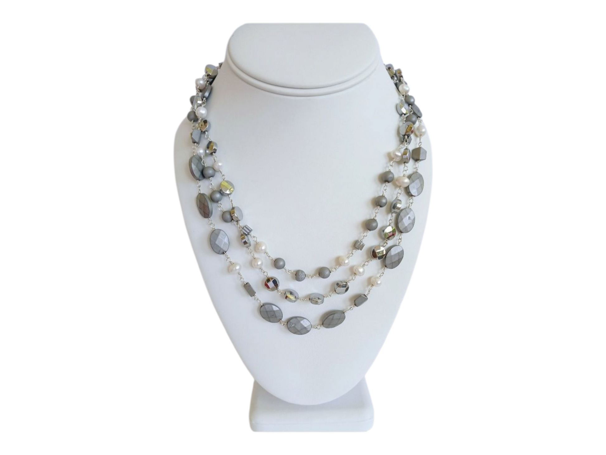 Natural Hematite and Pearl Beaded Necklace featuring a sparkly silver-tone design handcrafted for women who love elegant, unique jewelry. This eye-catching necklace combines the reflective shimmer of hematite with the soft luster of pearls, creating a sophisticated accessory perfect for both casual and formal wear. A thoughtful handmade gift for her, it blends natural beauty with artisanal style, making it a versatile statement piece for any jewelry collection.