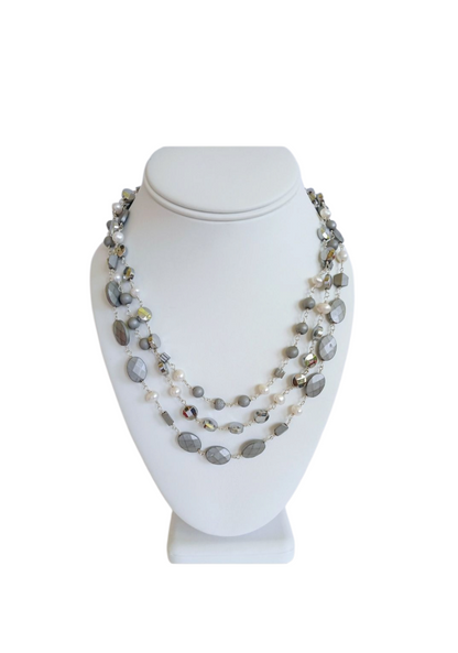 Natural Hematite and Pearl Beaded Necklace featuring a sparkly silver-tone design handcrafted for women who love elegant, unique jewelry. This eye-catching necklace combines the reflective shimmer of hematite with the soft luster of pearls, creating a sophisticated accessory perfect for both casual and formal wear. A thoughtful handmade gift for her, it blends natural beauty with artisanal style, making it a versatile statement piece for any jewelry collection.