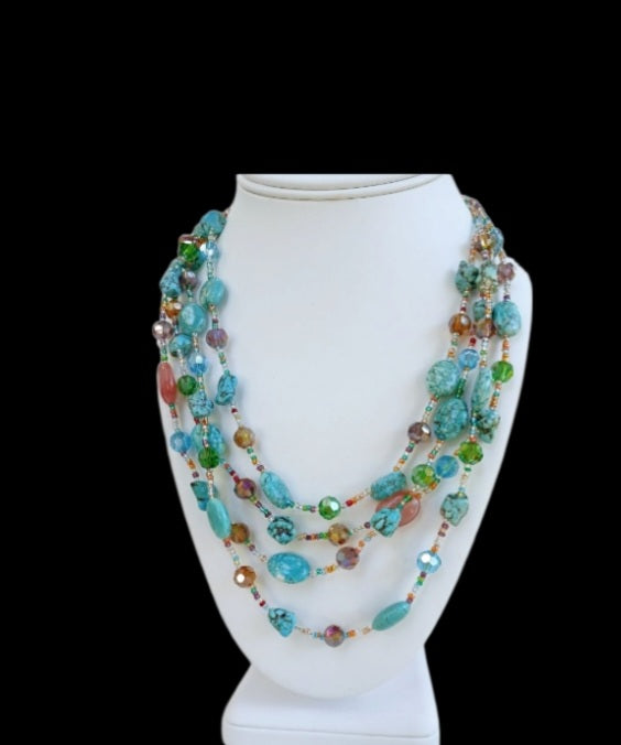 Turquoise, Magnesite, and Cherry Quartz Chunky Beaded Statement Necklace handcrafted for women who love bold, colorful jewelry. This handmade necklace features vibrant blue turquoise and magnesite beads combined with striking cherry quartz accents, creating a unique boho-style accessory. Perfect as a gift for her, it adds a pop of color and natural beauty to any outfit. Lightweight yet eye-catching, ideal for everyday wear or special occasions.