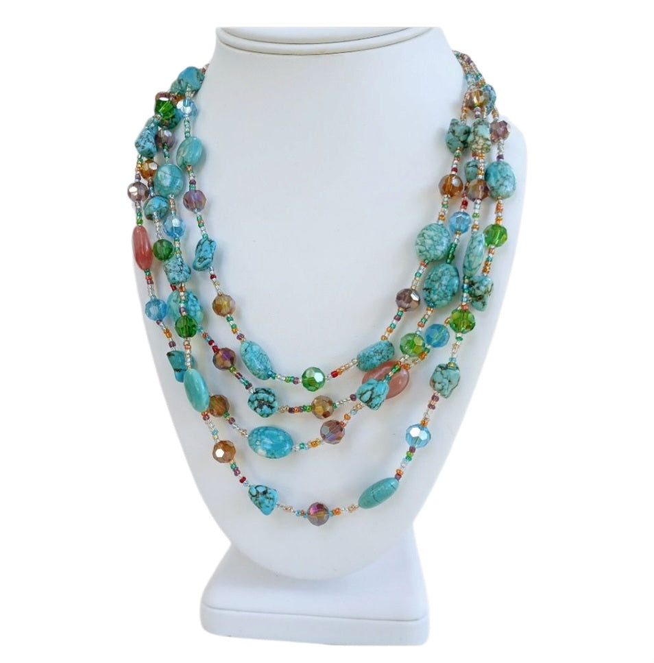 Turquoise, Magnesite, and Cherry Quartz Chunky Beaded Statement Necklace handcrafted for women who love bold, colorful jewelry. This handmade necklace features vibrant blue turquoise and magnesite beads combined with striking cherry quartz accents, creating a unique boho-style accessory. Perfect as a gift for her, it adds a pop of color and natural beauty to any outfit. Lightweight yet eye-catching, ideal for everyday wear or special occasions.