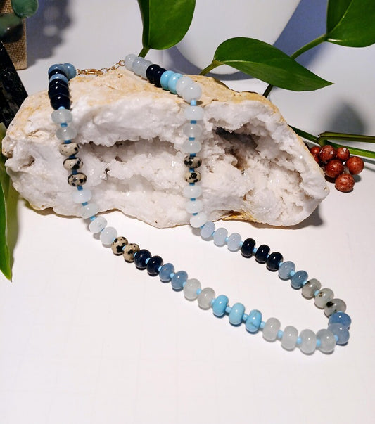 Natural Agate and Glass Beaded Necklace featuring a handcrafted design made with unique gemstone beads, perfect for women who love artistic and natural jewelry. This elegant agate necklace combines earthy tones and shimmering glass accents, creating a one-of-a-kind statement piece. Ideal as a thoughtful gift for her, it adds color and charm to any outfit. Lightweight and stylish, this handmade jewelry blends boho flair with the healing beauty of natural stones.
