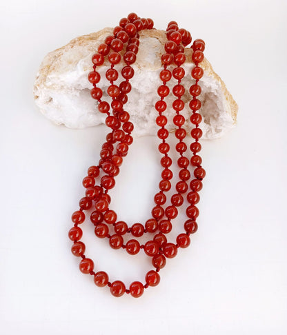 Carnelian Handmade Beaded Long Necklace featuring bold red agate beads crafted into a chunky statement piece for women. This boho layered necklace combines vibrant carnelian stones with artisanal beadwork, creating a unique accessory perfect for adding warmth and energy to any outfit. Lightweight and eye-catching, it makes a thoughtful gift for her, ideal for everyday wear or special occasions, blending natural beauty with handcrafted elegance.