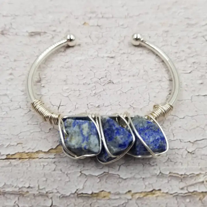Natural crystal alloy bracelet available in 3 color options, featuring adjustable sizing for a comfortable fit. This handmade healing stone jewelry piece combines boho style with crystal energy benefits, making it a thoughtful gift for her. Perfect for everyday wear or spiritual practices, it adds a touch of natural beauty and positive vibes to any outfit. A versatile accessory that blends fashion with wellness