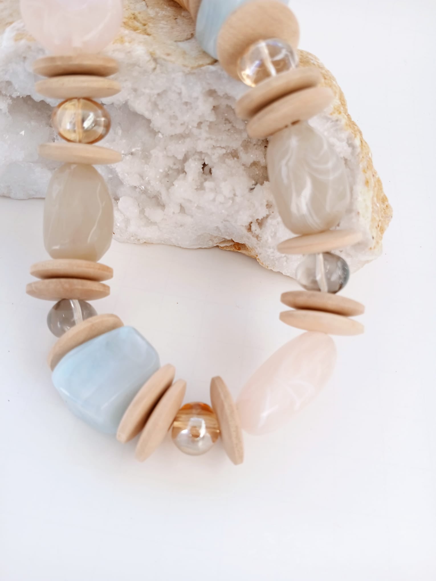 Handmade short necklace for women featuring natural stone and wood beads in a chunky, earthy design. This boho statement necklace blends organic textures and spiritual energy, making it a unique accessory for everyday wear or special occasions. Perfect as a thoughtful gift, the handcrafted piece highlights a harmonious mix of natural materials and bold style, ideal for those who appreciate artisanal and grounding jewelry.
