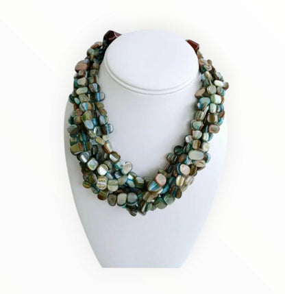 Neutral Chip Multi-Strand Abalone Shell and Pearl Necklace featuring chunky, bold beads handcrafted into a layered statement piece for women. This boho-style necklace combines the iridescent beauty of abalone shells with elegant pearls, creating a unique accessory perfect for adding natural charm and sophistication to any outfit. Lightweight and versatile, it makes a thoughtful handmade gift for her, ideal for everyday wear or special occasions with artisanal craftsmanship.