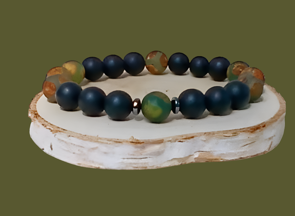 Handmade Tibetan-style black onyx and agate bracelet featuring healing gemstones known for their protective and grounding properties. This men’s lucky charm jewelry piece blends traditional craftsmanship with modern style, making it an ideal gift for him. Perfect for everyday wear or special occasions, the bracelet offers both spiritual benefits and a bold, masculine accessory that complements any outfit with its sleek black design.