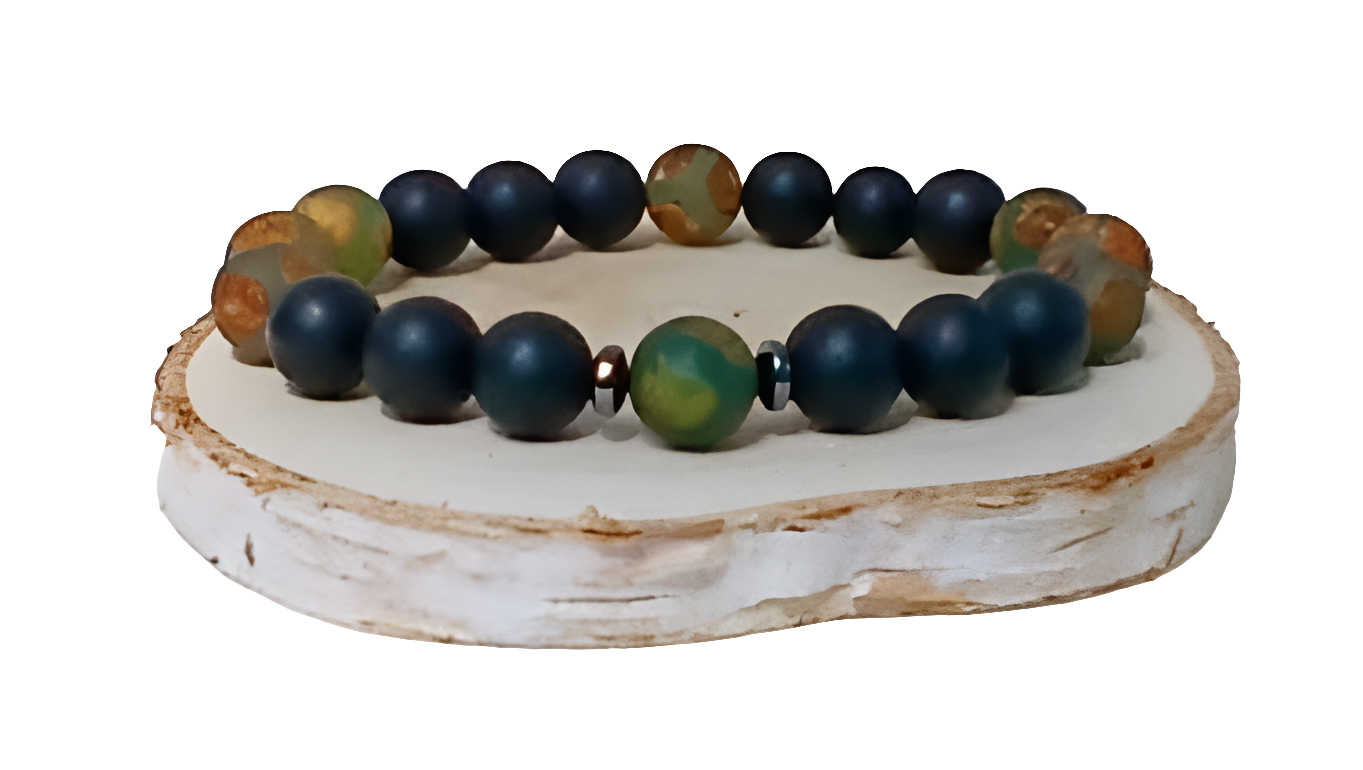 Handmade Tibetan-style black onyx and agate bracelet featuring healing gemstones known for their protective and grounding properties. This men’s lucky charm jewelry piece blends traditional craftsmanship with modern style, making it an ideal gift for him. Perfect for everyday wear or special occasions, the bracelet offers both spiritual benefits and a bold, masculine accessory that complements any outfit with its sleek black design.