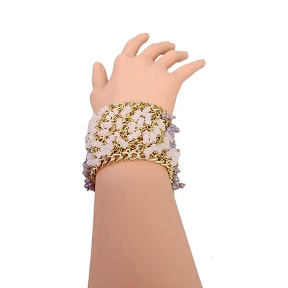 Handmade chunky statement bracelet featuring pastel crystal fringe accents on a bold gold link chain, designed for women who love vibrant and artistic fashion accessories. This eye-catching bracelet blends soft colors with a glamorous edge, making it a perfect gift for birthdays, holidays, or special occasions. Crafted with care, it adds a playful yet elegant touch to any outfit, ideal for dressing up casual looks or completing evening wear.