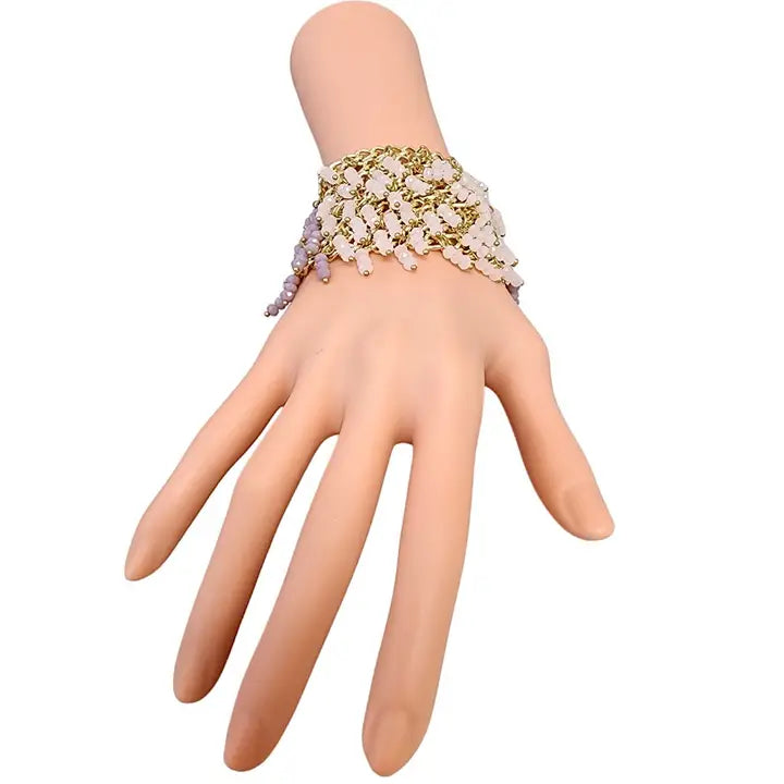 Handmade chunky statement bracelet featuring pastel crystal fringe accents on a bold gold link chain, designed for women who love vibrant and artistic fashion accessories. This eye-catching bracelet blends soft colors with a glamorous edge, making it a perfect gift for birthdays, holidays, or special occasions. Crafted with care, it adds a playful yet elegant touch to any outfit, ideal for dressing up casual looks or completing evening wear.
