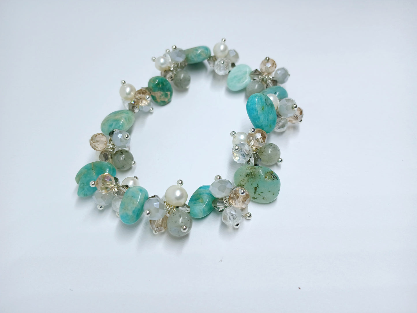 Aqua Cultured Pearl Stretch Bracelet featuring turquoise and amazonite beads in a beautifully handcrafted healing crystal jewelry design. This vibrant bracelet combines soothing blue and green tones with the lustrous glow of cultured pearls, making it an ideal gift for girls and women who appreciate handmade, spiritual accessories. Lightweight and stretchy for comfortable everyday wear, it promotes balance, calm, and positive energy while adding a stylish, boho touch to any outfit.