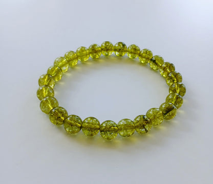 Peridot Bracelet featuring natural crystals handcrafted into a chakra energy jewelry piece designed for women. This positivity stone bracelet combines vibrant green peridot and sunny citrine gemstones, promoting healing, abundance, and emotional balance. Handmade with care, it makes a meaningful gift for spiritual wellness and everyday wear. Lightweight and stylish, this gemstone bracelet blends artisanal craftsmanship with natural beauty and healing energy.