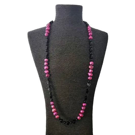 Pink and black freshwater pearl necklace featuring a crystal cluster pendant on a 36-inch chain, creating an elegant statement piece. This handmade jewelry combines natural pearls and sparkling crystals, perfect for formal occasions or special events. A sophisticated gift for her, blending classic beauty with modern design. Ideal for weddings, parties, or upscale gatherings, adding a touch of refined charm to any outfit.