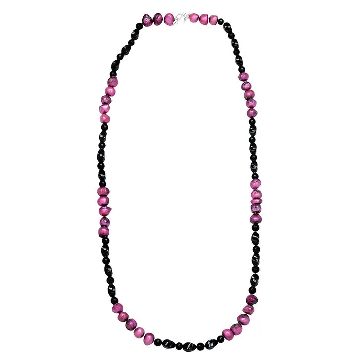 Pink and black freshwater pearl necklace featuring a crystal cluster pendant on a 36-inch chain, creating an elegant statement piece. This handmade jewelry combines natural pearls and sparkling crystals, perfect for formal occasions or special events. A sophisticated gift for her, blending classic beauty with modern design. Ideal for weddings, parties, or upscale gatherings, adding a touch of refined charm to any outfit.