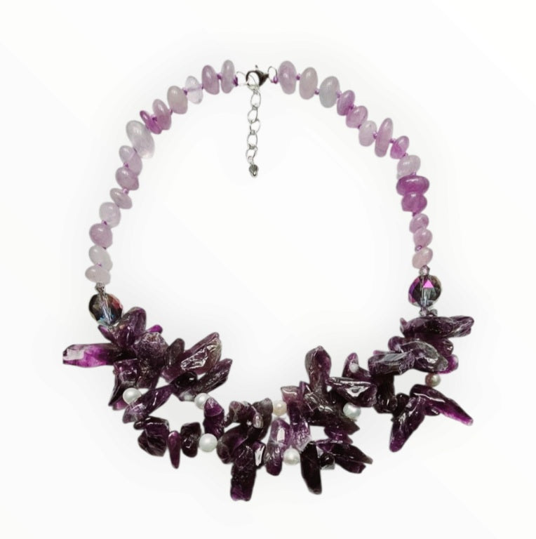 Handmade amethyst and crystal gemstone necklace featuring dainty boho design perfect for layering and stacking. This healing stone necklace combines the calming energy of amethyst with sparkling crystals, creating a delicate yet meaningful accessory. Ideal as a thoughtful gift for her, it enhances any outfit with a touch of spiritual elegance. Lightweight and versatile, this layered necklace is perfect for everyday wear and bohemian style lovers