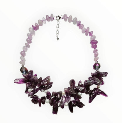 Handmade amethyst and crystal gemstone necklace featuring dainty boho design perfect for layering and stacking. This healing stone necklace combines the calming energy of amethyst with sparkling crystals, creating a delicate yet meaningful accessory. Ideal as a thoughtful gift for her, it enhances any outfit with a touch of spiritual elegance. Lightweight and versatile, this layered necklace is perfect for everyday wear and bohemian style lovers