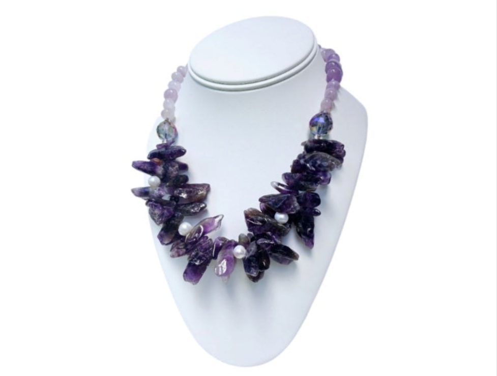 Handmade amethyst and crystal gemstone necklace featuring dainty boho design perfect for layering and stacking. This healing stone necklace combines the calming energy of amethyst with sparkling crystals, creating a delicate yet meaningful accessory. Ideal as a thoughtful gift for her, it enhances any outfit with a touch of spiritual elegance. Lightweight and versatile, this layered necklace is perfect for everyday wear and bohemian style lovers