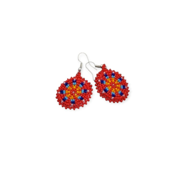 Red Handmade Beaded Earrings for women featuring vibrant native-style beadwork with multicolor accents in a bold boho medallion design. These statement festival earrings showcase intricate craftsmanship and colorful patterns, perfect for adding a pop of color to any outfit. Ideal gift for women who appreciate unique, artisanal jewelry with cultural significance. Lightweight and striking, these earrings elevate both casual and festive looks with artistic flair.