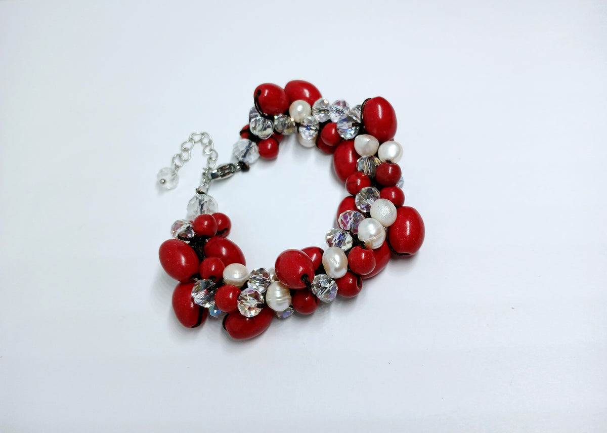 Magnesite Pearl Crystal Red Bracelet handcrafted with vibrant red crystals, white pearls, and magnesite stones for a bold, elegant look. This statement bracelet is perfect for girls and women, ideal as bridal jewelry or a thoughtful bridesmaid gift. The handmade design adds a touch of glamour to weddings, parties, or special occasions. A beautiful and meaningful accessory that makes a memorable gift for women who love colorful, unique jewelry.