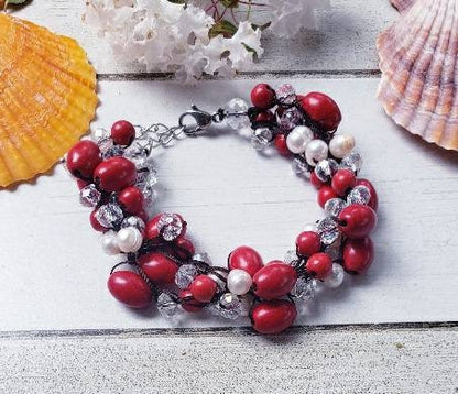 Magnesite Pearl Crystal Red Bracelet handcrafted with vibrant red crystals, white pearls, and magnesite stones for a bold, elegant look. This statement bracelet is perfect for girls and women, ideal as bridal jewelry or a thoughtful bridesmaid gift. The handmade design adds a touch of glamour to weddings, parties, or special occasions. A beautiful and meaningful accessory that makes a memorable gift for women who love colorful, unique jewelry.