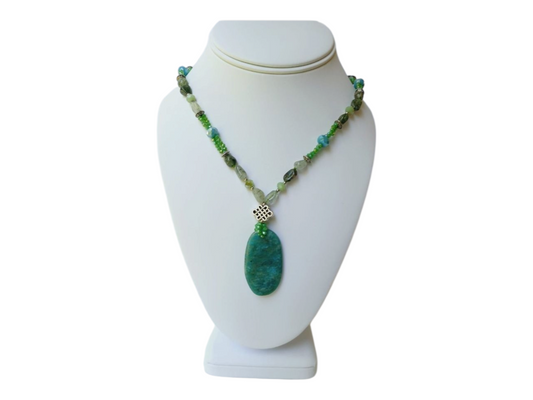 Amazonite, Jasper, and Quartz Multi-Stone Necklace featuring a unique Russian pendant design, handcrafted into a bold boho statement necklace for women. This green-toned jewelry piece blends natural gemstones to create a vibrant accessory full of healing energy and artistic charm. Perfect as a handmade gift for her, it adds a distinctive touch to any outfit, ideal for everyday wear or special occasions, combining artisanal craftsmanship with natural beauty.