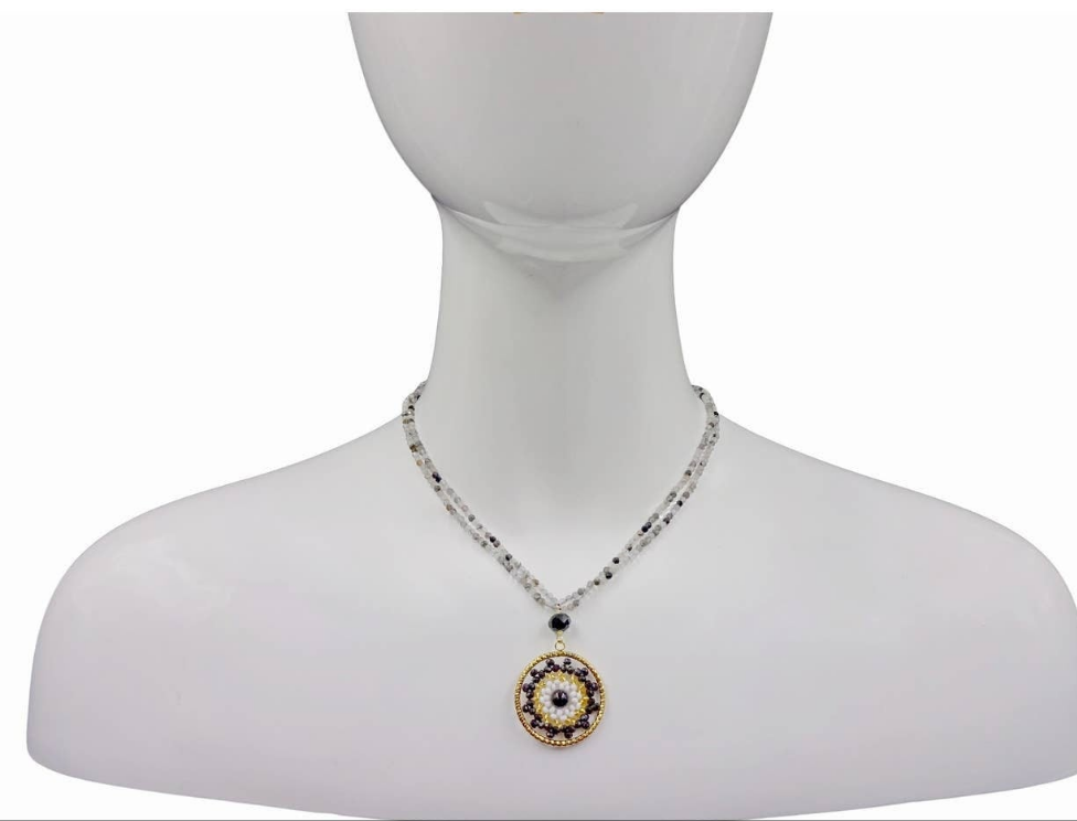 Quartz Medallion Pendant Necklace for women featuring a delicate handmade design with a sparkling crystal centerpiece and intricate beaded detailing. This boho-style statement jewelry piece combines elegance and artisanal craftsmanship, perfect for layering or wearing alone. Ideal gift for her on birthdays, holidays, or special occasions. Adds a touch of natural beauty and sophistication to casual or formal outfits with a timeless handmade charm.