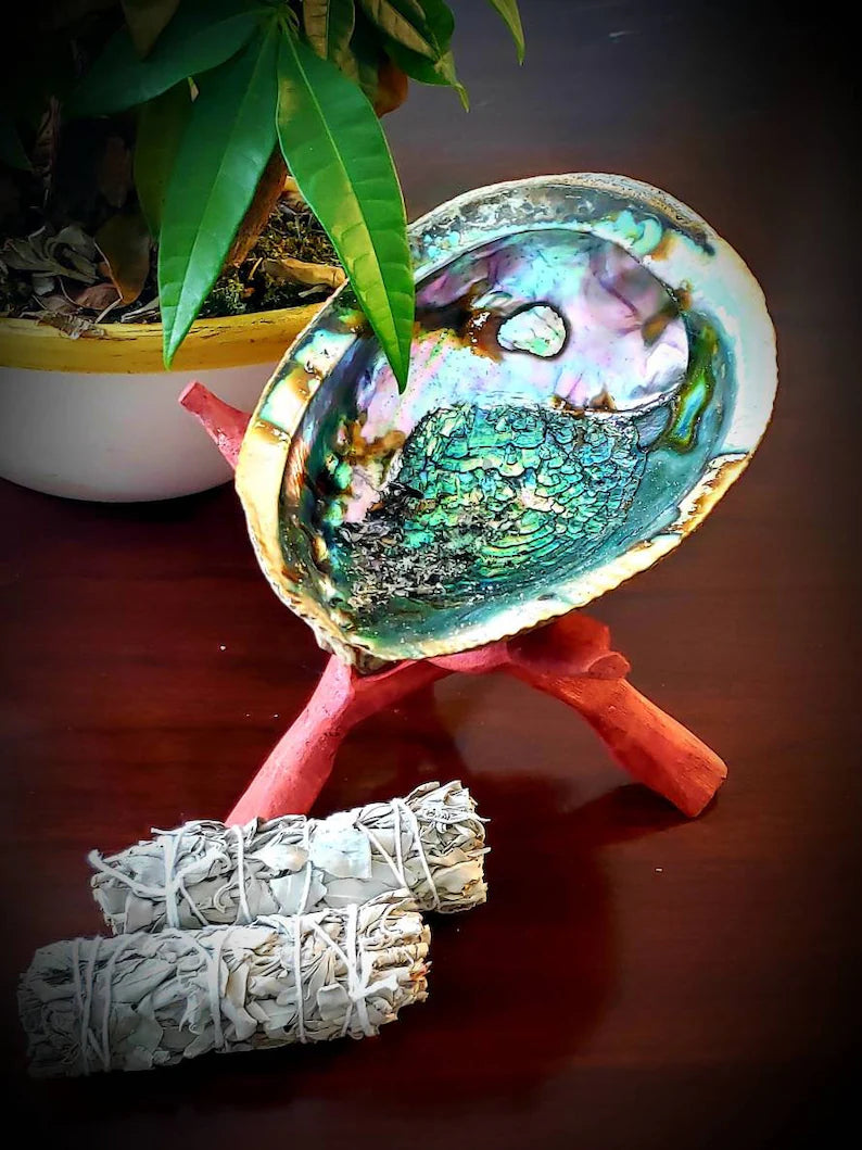 Complete smudging kit featuring California white sage bundles and a natural abalone shell, designed for spiritual cleansing and purification rituals. This handcrafted set is perfect for housewarming gifts or personal wellness practices, helping to clear negative energy and promote positive vibes. Ideal for those who practice smudging ceremonies, meditation, or energy healing, combining traditional elements in a beautiful, easy-to-use ritual kit.