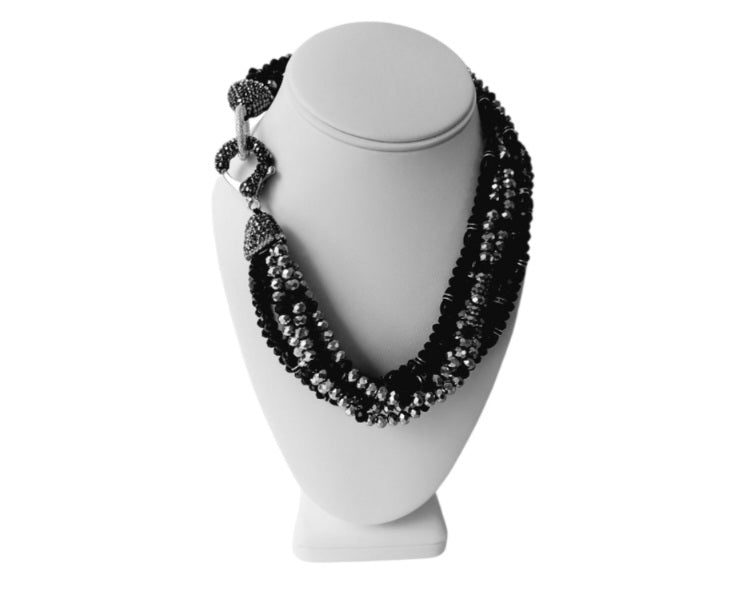 Black silver crystal torsade choker necklace featuring chunky, bold crystals for a striking statement look. Designed for women who want glamorous evening jewelry, this elegant choker adds sparkle and sophistication to any outfit. Perfect as a gift for her, it combines modern style with timeless glam. Ideal for special occasions, parties, or formal events, this crystal necklace delivers eye-catching allure and confident, bold fashion.