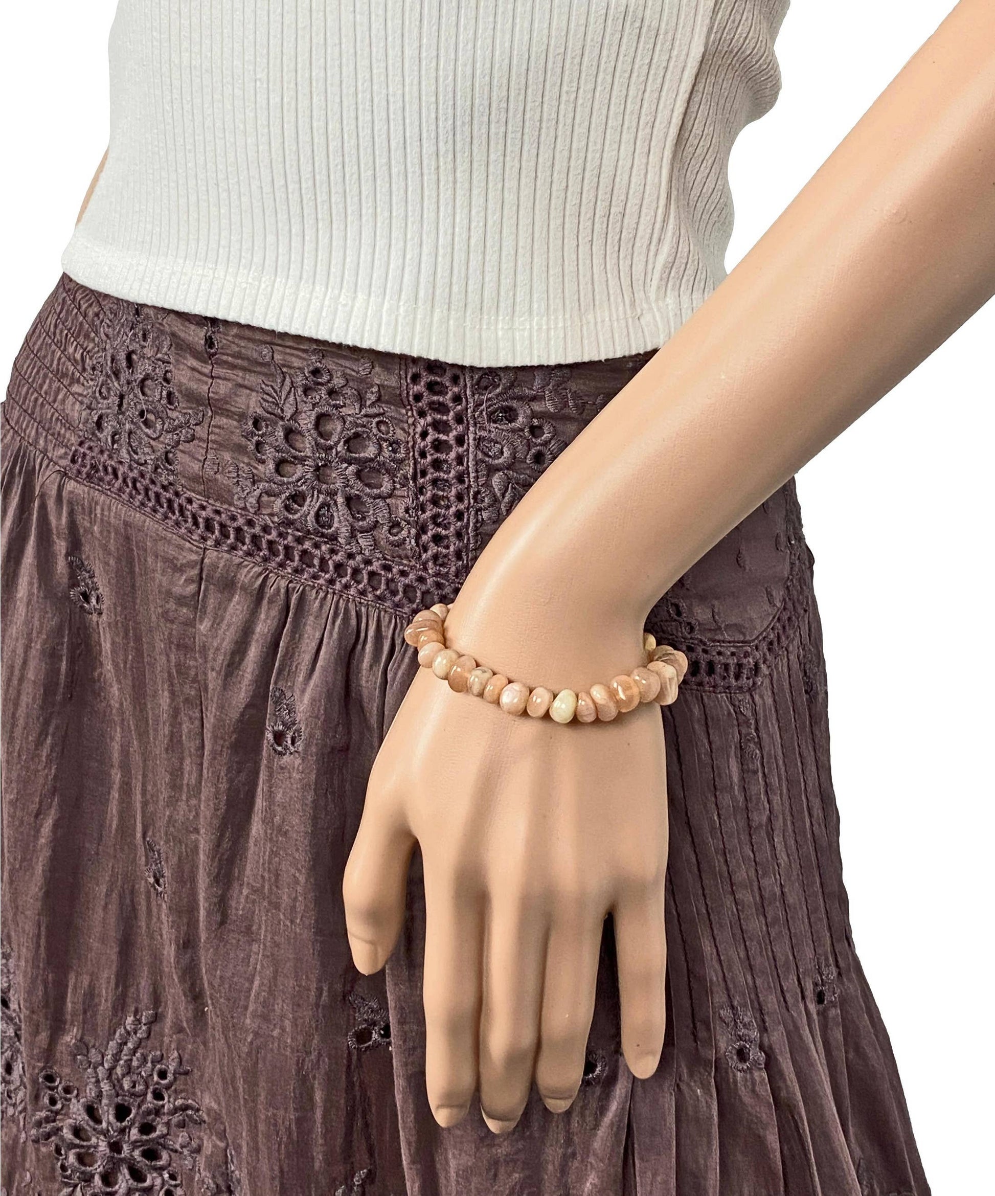 Genuine Sunstone Nugget Stretch Bracelet featuring handmade crystal beads designed for women who appreciate natural healing gemstone jewelry. This artisanal sunstone bracelet showcases radiant orange hues symbolizing positivity and energy. Lightweight and comfortable, it makes a thoughtful gift for her, perfect for spiritual wellness or everyday wear. Combining vibrant sunstone nuggets with stretchy design, this bracelet blends style, healing properties, and handcrafted elegance.