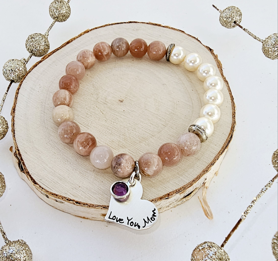 Sunstone Freshwater Pearl Bracelet, a handmade boho jewelry piece combining natural sunstone and delicate freshwater pearls. This elegant women’s bracelet offers a unique blend of warm, glowing stones perfect for everyday wear or special occasions. Ideal as a meaningful gift for mom or Mother’s Day, it symbolizes love, beauty, and positive energy. Stylish and versatile, it complements casual and dressy outfits with effortless charm.