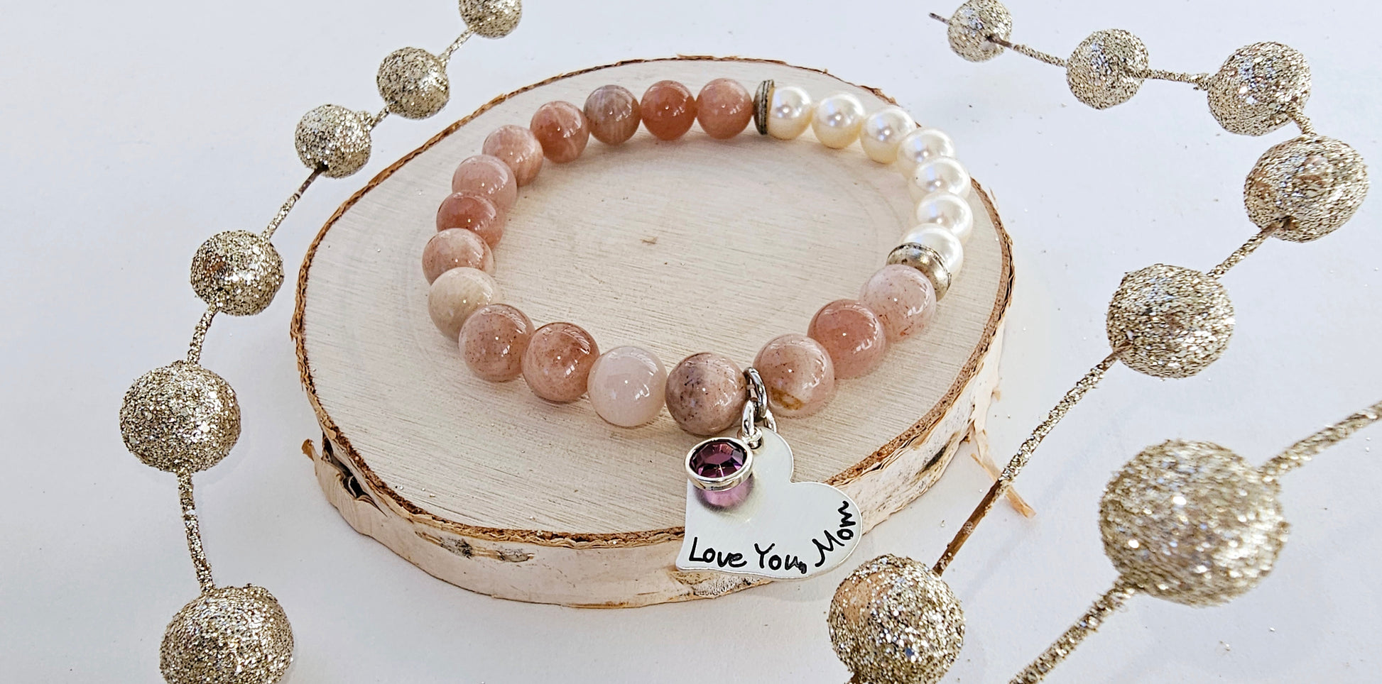 Sunstone Freshwater Pearl Bracelet, a handmade boho jewelry piece combining natural sunstone and delicate freshwater pearls. This elegant women’s bracelet offers a unique blend of warm, glowing stones perfect for everyday wear or special occasions. Ideal as a meaningful gift for mom or Mother’s Day, it symbolizes love, beauty, and positive energy. Stylish and versatile, it complements casual and dressy outfits with effortless charm.
