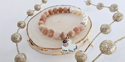 Sunstone Freshwater Pearl Bracelet, a handmade boho jewelry piece combining natural sunstone and delicate freshwater pearls. This elegant women’s bracelet offers a unique blend of warm, glowing stones perfect for everyday wear or special occasions. Ideal as a meaningful gift for mom or Mother’s Day, it symbolizes love, beauty, and positive energy. Stylish and versatile, it complements casual and dressy outfits with effortless charm.
