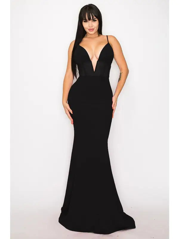 Black Corset Dress with a flattering V-neckline and dramatic mermaid skirt, crafted from sleek crepe fabric for a sculpted, bodycon fit. This elegant evening gown features a secure zipper back and structured corset bodice, perfect for formal events, parties, or special occasions. Designed for women who love timeless glamour and sophisticated style, this black dress makes a bold, graceful statement at any event.