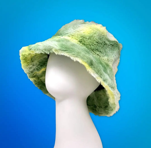 Tie Dye Handmade Green Watercolor Faux Fur Bucket Hat featuring a soft, plush texture and warm design perfect for fall and cooler seasons. This trendy unisex hat for men and women showcases a unique green watercolor-inspired tie dye pattern that adds bold, artistic flair to any outfit. Cozy and eye-catching, it’s ideal for casual wear, festivals, or outdoor adventures. A stylish statement piece and thoughtful gift for fashion-forward individuals.