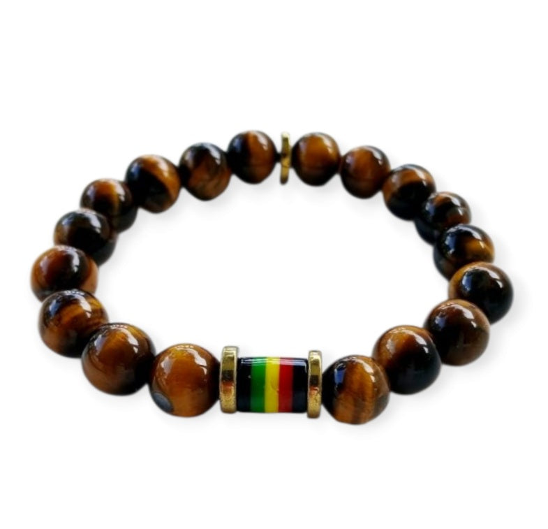 Tiger Eye Bracelet for men featuring a handmade design inspired by Rastafarian and reggae culture, crafted to promote protection, prosperity, and strength. This lucky mantra jewelry combines earthy Tiger Eye beads with bold, vibrant accents for a spiritual yet stylish look. Perfect for daily wear or meaningful gifting, it’s ideal for those seeking grounding energy and cultural expression. A powerful accessory with deep symbolism and unique design.