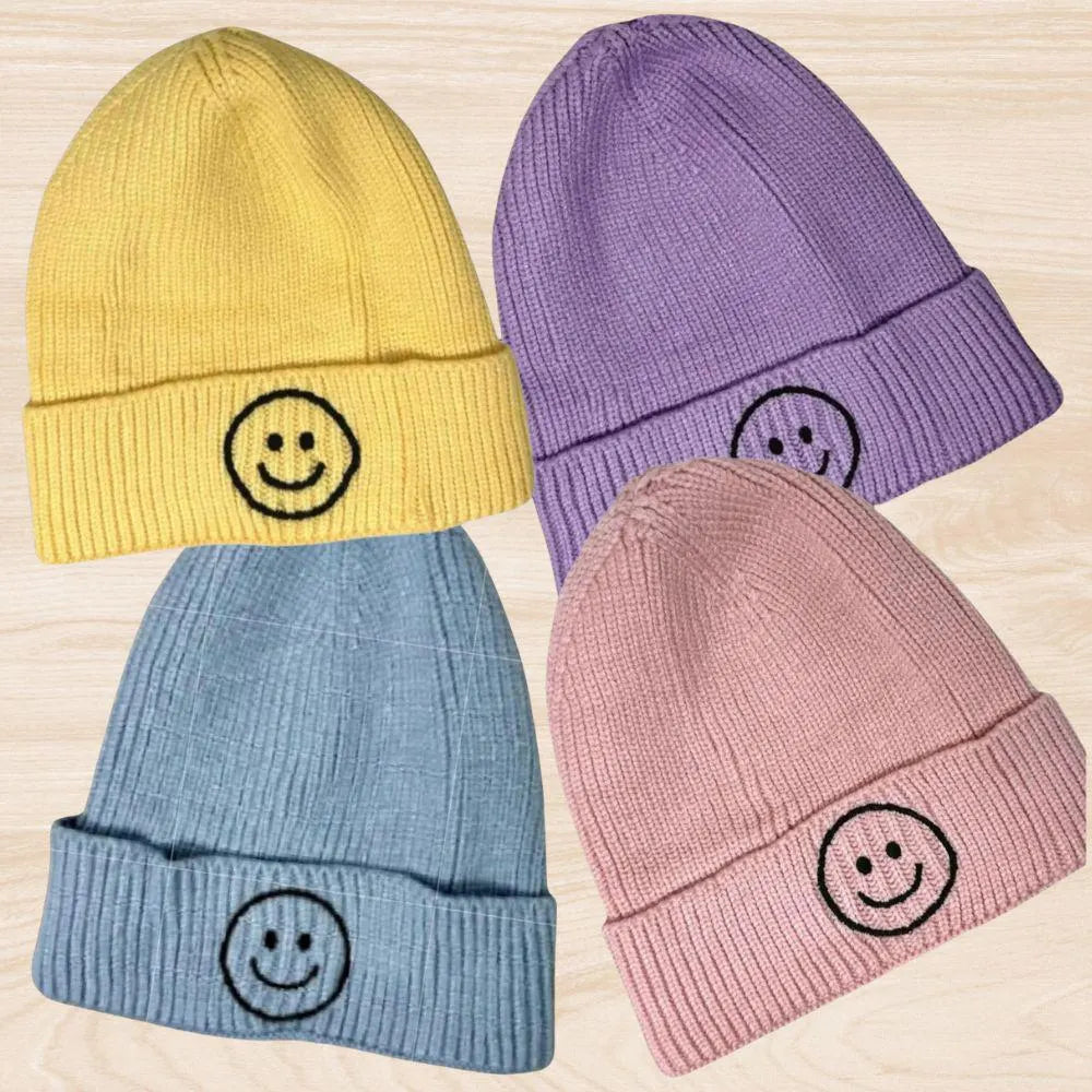 Trendy smiley face beanie hat made from cozy knit fabric, perfect for kids, teens, and adults. This fun and stylish hat adds warmth and personality to any fall, winter, or spring outfit. With its cheerful embroidered design, it’s a great gift idea and a playful accessory for all ages. Comfortable and eye-catching, this knit beanie offers both fashion and function, keeping you warm while spreading positive vibes in cooler weather.