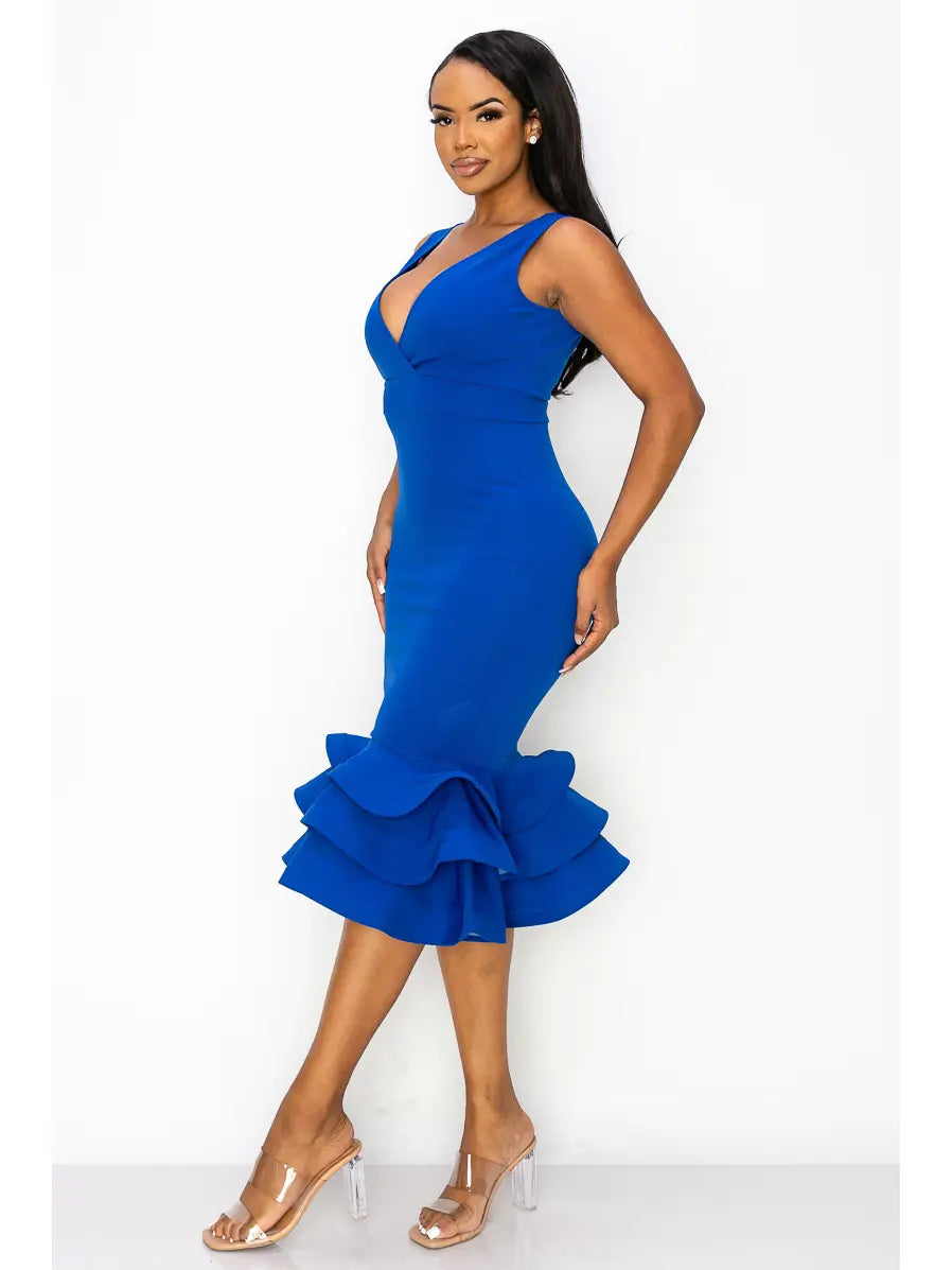Triple Ruffle Mini Dress featuring a flattering V-neckline and tiered ruffle hem for a playful, feminine look. This flowy, lightweight dress is perfect for summer days, casual outings, or elegant parties. Designed for women who love comfort and style, the short silhouette creates effortless movement and charm. An ideal warm-weather outfit or gift, this dress blends chic design with easy elegance for any occasion.