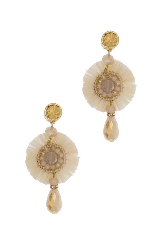 Statement Crystal Drop Earrings featuring handmade beaded design with sparkling crystal dangles, perfect for women who love elegant and unique jewelry. These artisanal earrings combine shimmer and craftsmanship to create a bold accessory ideal for weddings, parties, or everyday glam. Lightweight and eye-catching, they make a thoughtful gift for women or bridesmaids, adding a touch of sophistication and charm to any outfit with their radiant, handcrafted beauty.
