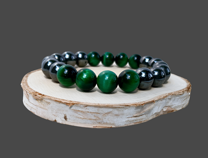 Handmade unisex bracelet featuring natural tiger eye and hematite stones, designed as a stylish lucky charm accessory for men and women. This green-hued natural stone bracelet combines grounding and protective properties, perfect for everyday wear or gifting. Crafted with care, it offers a unique blend of earthy elegance and modern style, making it a versatile jewelry piece suitable for anyone seeking both fashion and positive energy.