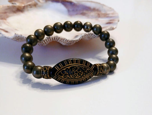 Pyrite Bracelet with 8mm handmade beaded crystals, designed to promote abundance, good luck, and positive spiritual energy. This unisex bracelet combines shimmering pyrite stones crafted into a stylish accessory for both women and men. Perfect as a meaningful gift, it supports confidence, prosperity, and protection. Lightweight and versatile, this abundance bracelet blends healing properties with elegant, handmade jewelry for everyday wear or special occasions.