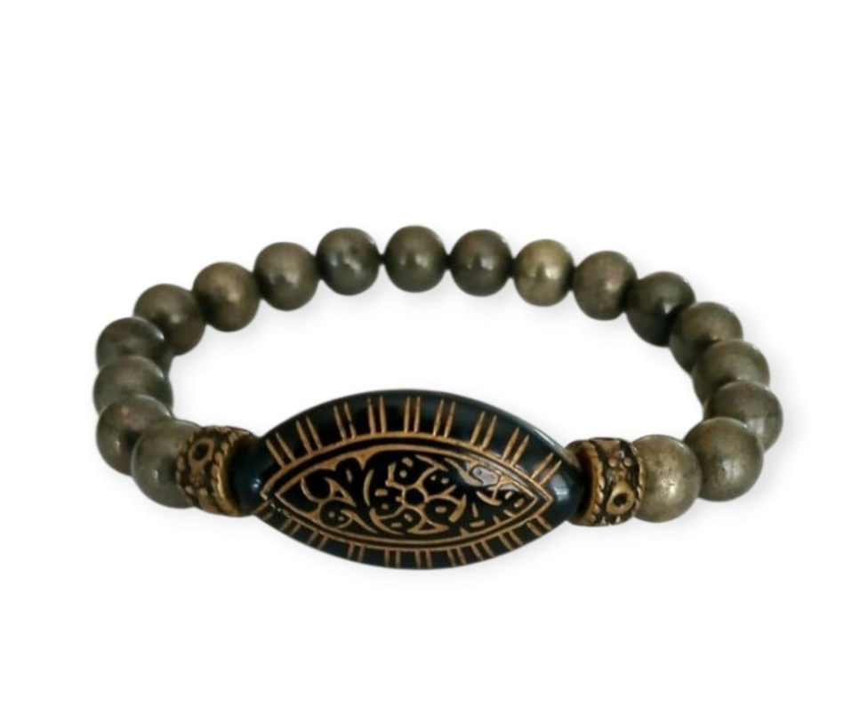 Pyrite Bracelet with 8mm handmade beaded crystals, designed to promote abundance, good luck, and positive spiritual energy. This unisex bracelet combines shimmering pyrite stones crafted into a stylish accessory for both women and men. Perfect as a meaningful gift, it supports confidence, prosperity, and protection. Lightweight and versatile, this abundance bracelet blends healing properties with elegant, handmade jewelry for everyday wear or special occasions.