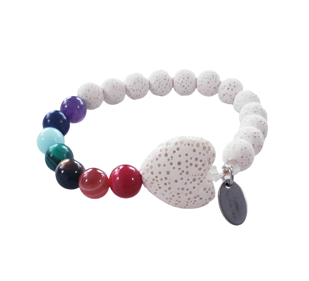 Handmade white lava stone diffuser bracelet designed for women, featuring natural volcanic stones known for their healing and chakra balancing properties. This stretch bracelet combines crystal healing benefits with stylish, lightweight comfort, perfect for everyday wear or meditation practices. Ideal as a thoughtful gift, it allows essential oils to be diffused throughout the day, blending wellness with elegant, natural jewelry design.